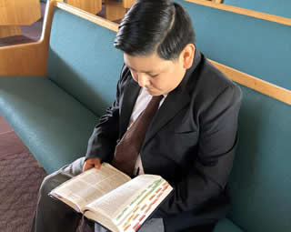 boy reading bible